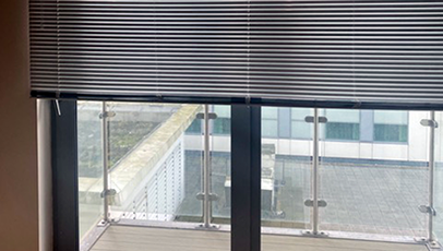 Half drawn venetian blinds